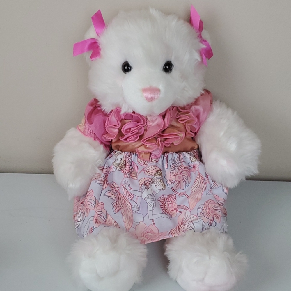Build-A-Bear withe color with a touch of pink.